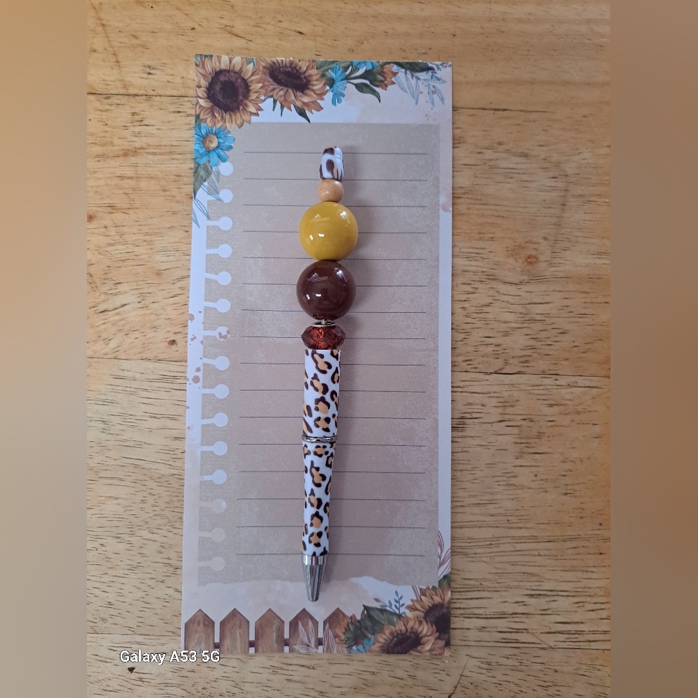 White,brown Leopard print pen